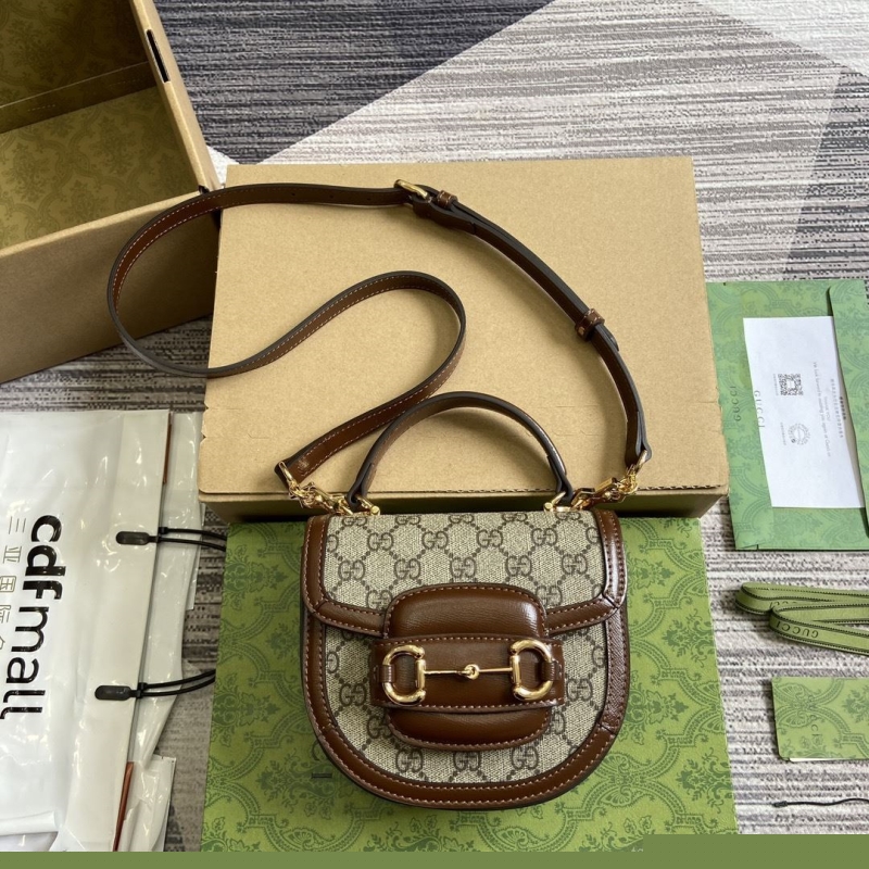 G*u*i top handle bags
